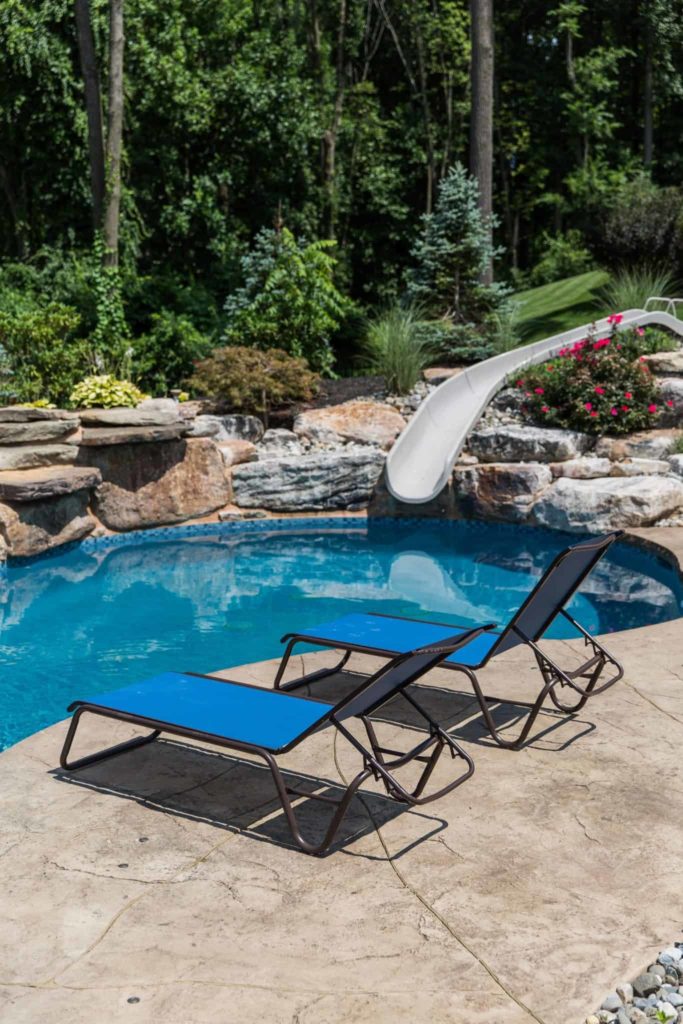5 Pool Features to Make the Joneses Turn Green with Envy Over Your Inground Swimming Pool