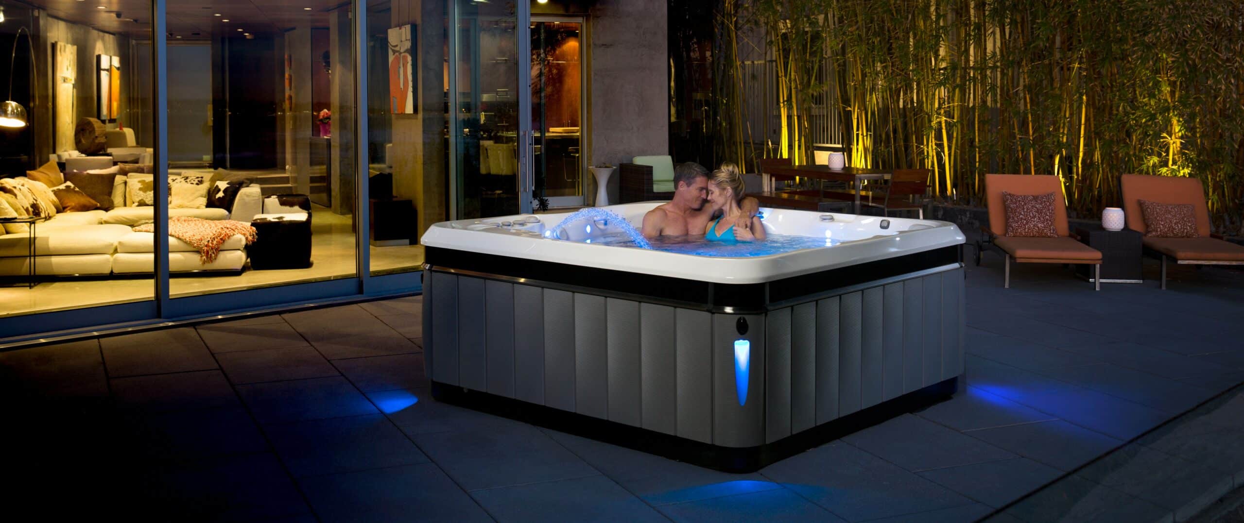 Couple enjoying romantic date in the hot tub